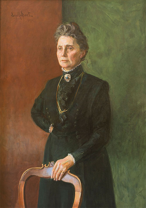 Anna Rogstad (1854–1938), Frisinnede Venstre. Den første kvinnen som møtte på Stortinget. Møtte som vara 17. mars 1911, to år før allmenn stemmerett for kvinner ble innført. Kunstner: Eyolf Soot.